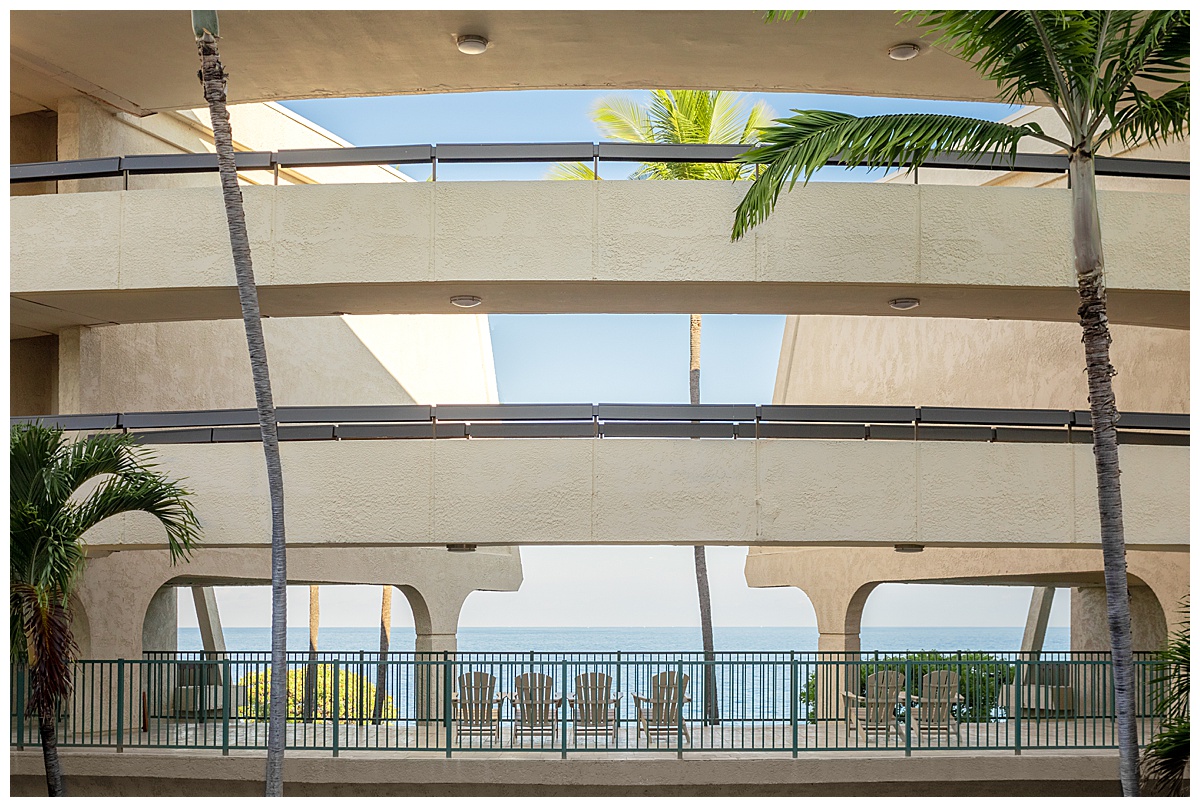 The hallways of the Outrigger Kona Resort. The resort is all outside so you can see the view of the ocean as you walk between rooms.